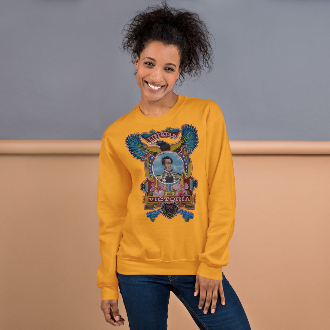Gold sweatshirt featuring my hand-drawn El Libertador Simón Bolívar design, from the Bareta Fina Designs blog