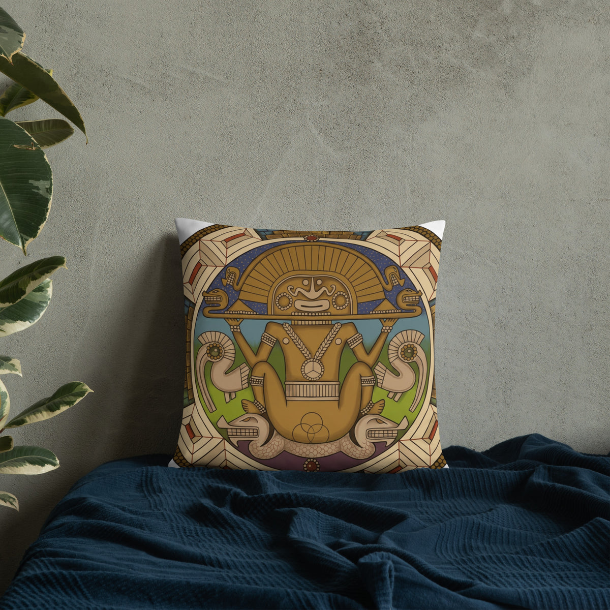 Throw pillow with hand-drawn pre-Columbian Sun God deity art by Bareta Fina Designs