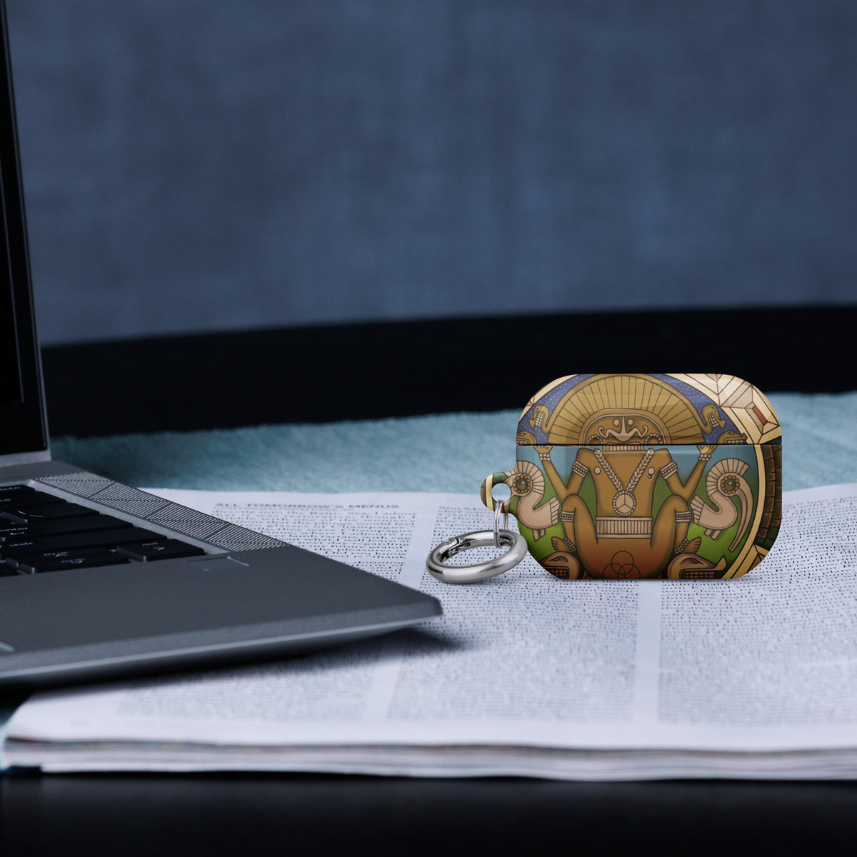 White AirPods Pro case (2nd generation) with hand-drawn pre-Columbian Sun God deity art by Bareta Fina Designs
