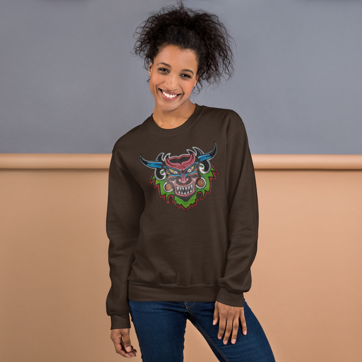 Dark chocolate brown unisex crewneck sweatshirt with hand-drawn Dancing Demon folk art by Bareta Fina Designs