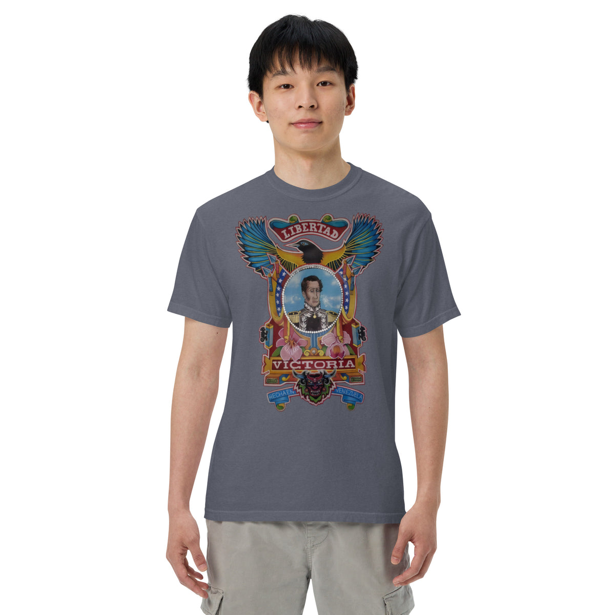 Denim unisex heavyweight tee with hand-drawn Simón Bolívar-inspired art – El Libertador heavyweight tee by Bareta Fina Designs