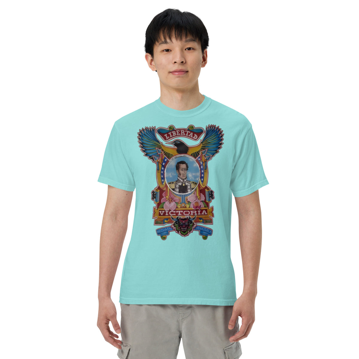 Lagoon blue unisex heavyweight tee with hand-drawn Simón Bolívar-inspired art – El Libertador heavyweight tee by Bareta Fina Designs