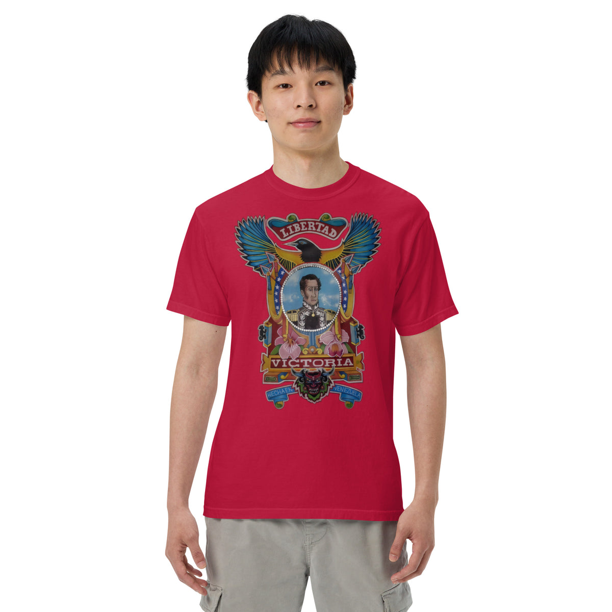 Red unisex heavyweight tee with hand-drawn Simón Bolívar-inspired art – El Libertador heavyweight tee by Bareta Fina Designs