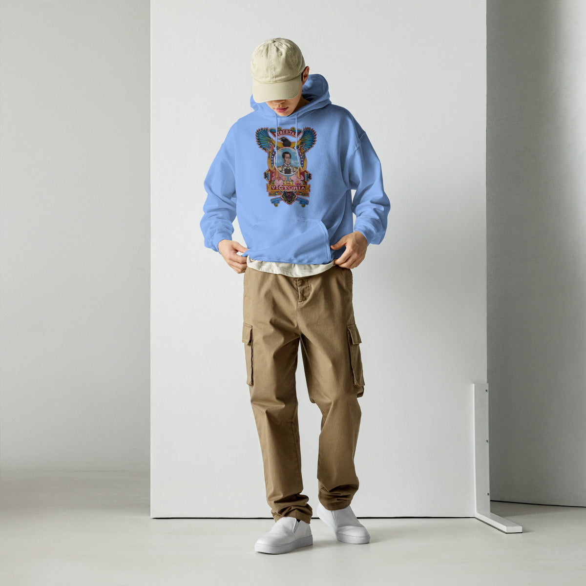 Carolina blue unisex hoodie with hand-drawn Simón Bolívar-inspired art – El Libertador hoodie by Bareta Fina Designs