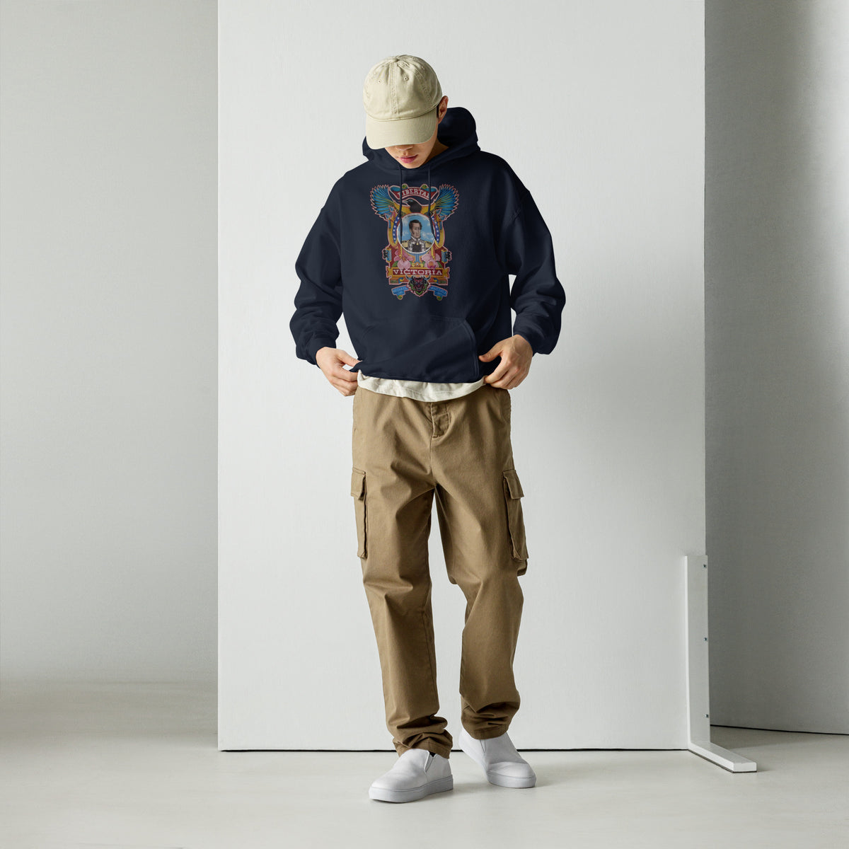 Navy unisex hoodie with hand-drawn Simón Bolívar-inspired art – El Libertador hoodie by Bareta Fina Designs