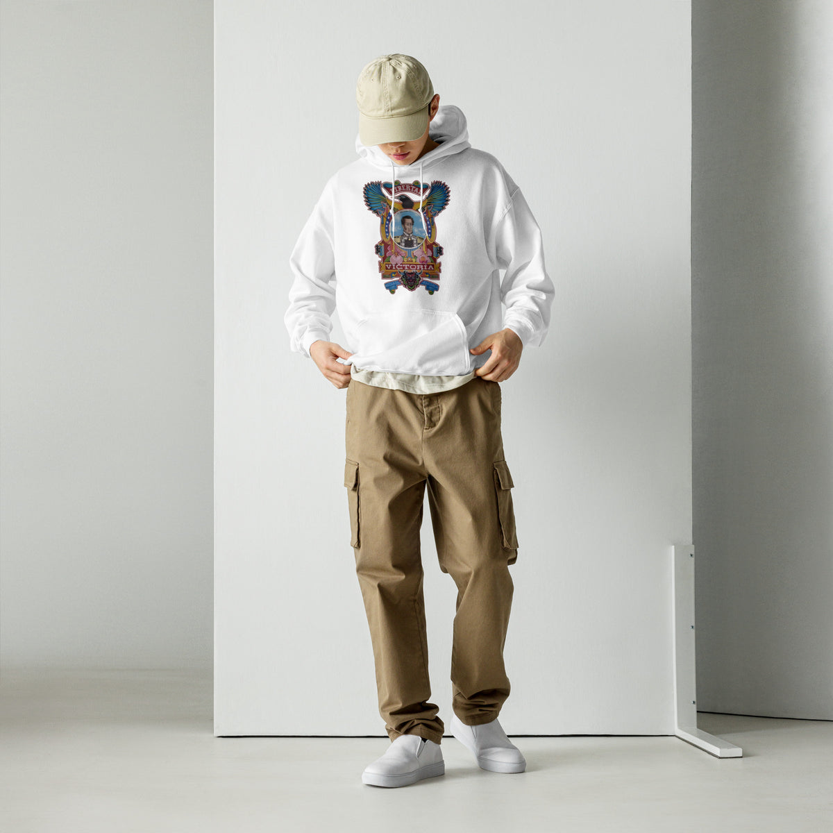 White unisex hoodie with hand-drawn Simón Bolívar-inspired art – El Libertador hoodie by Bareta Fina Designs